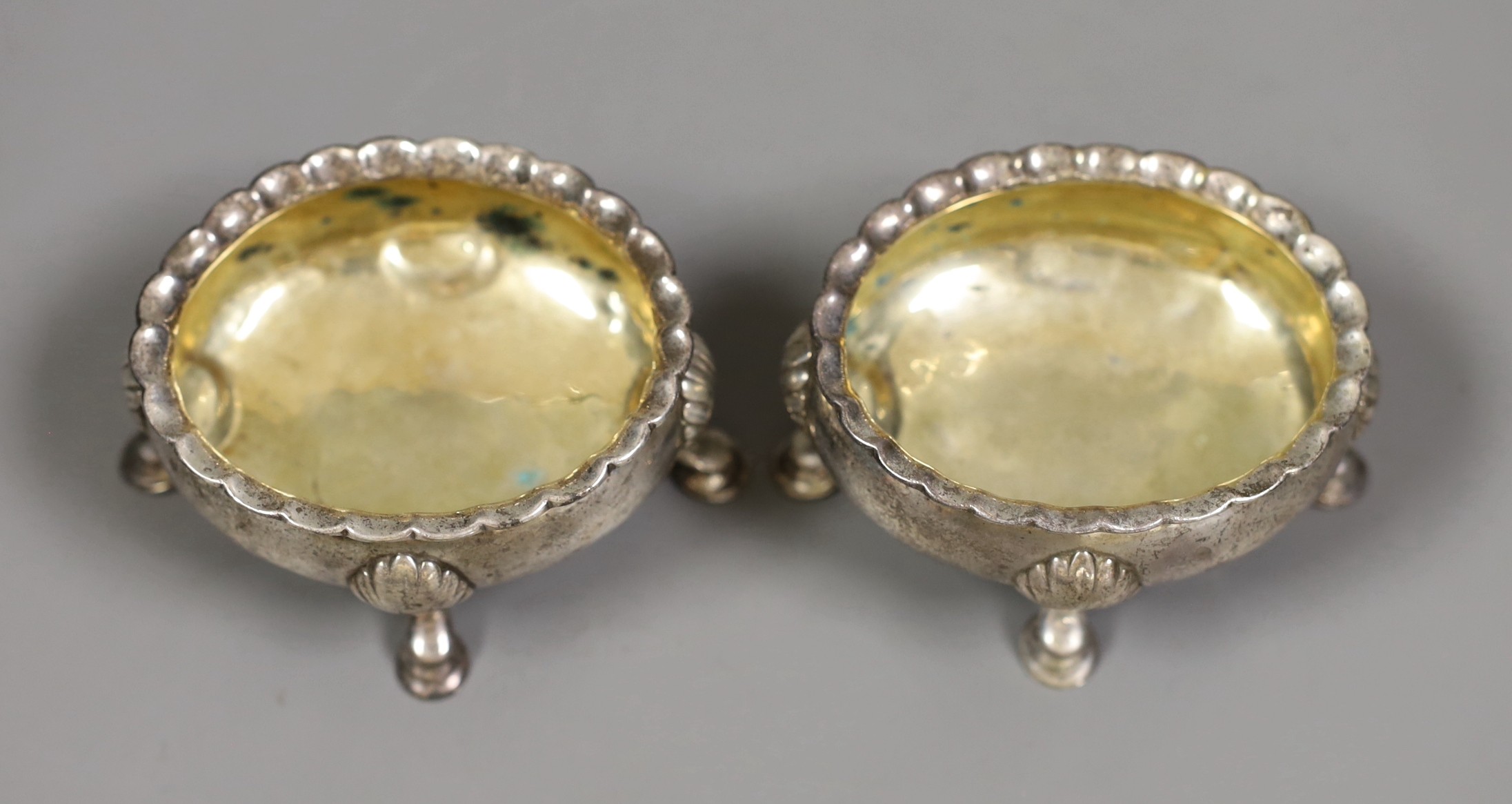 A near pair of mid 18th century silver salts, London 1746 and 1762, 6oz